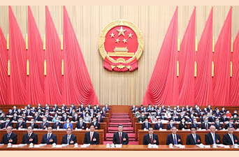 十四届全国人大一次会议开幕 习近平等在主席台就座