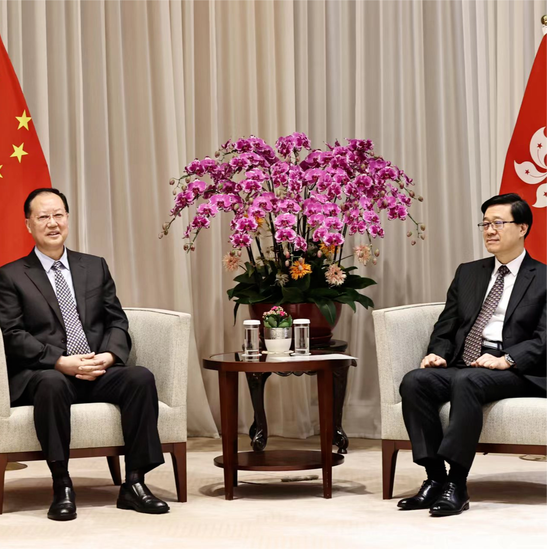 毛伟明会见李家超