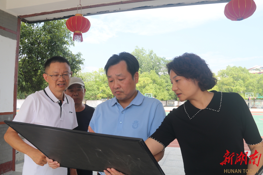 唐成调研学校建设