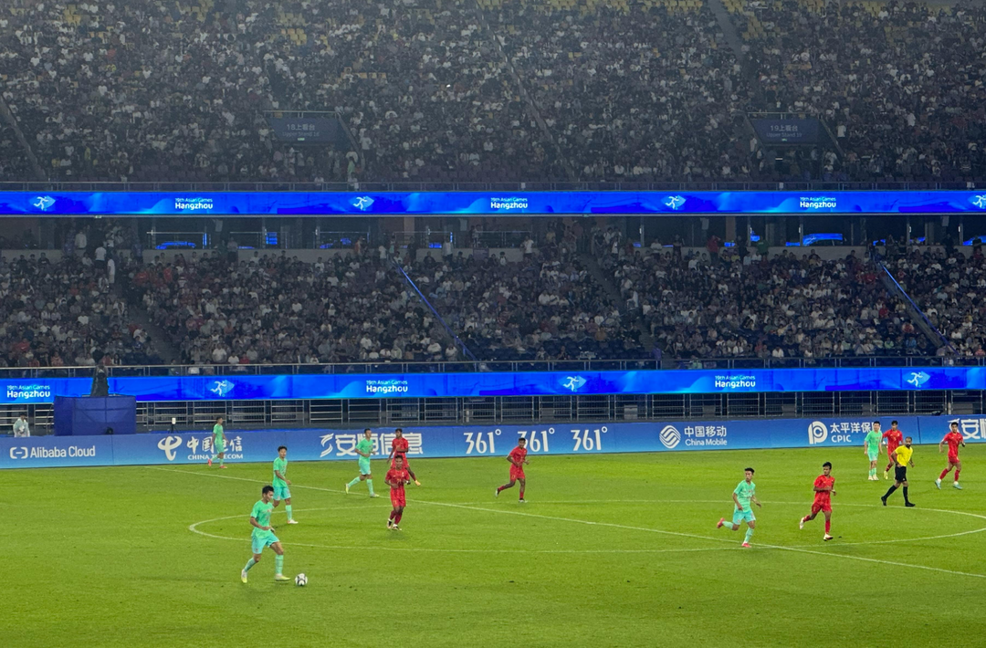 亚运会男足小组赛中国队取得两连胜 提前晋级淘汰赛