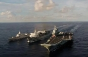 国防部：山东舰编队远海训练提高体系作战能力