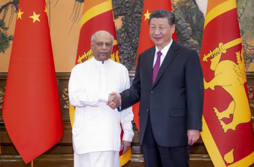 习近平会见斯里兰卡总理古纳瓦德纳